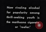 Image of marijuana cigarette New York City USA, 1939, second 4 stock footage video 65675035678