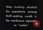 Image of marijuana cigarette New York City USA, 1939, second 9 stock footage video 65675035678