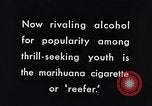 Image of marijuana cigarette New York City USA, 1939, second 10 stock footage video 65675035678