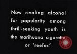 Image of marijuana cigarette New York City USA, 1939, second 12 stock footage video 65675035678