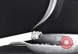 Image of marijuana cigarette New York City USA, 1939, second 13 stock footage video 65675035678