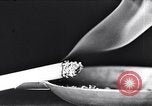 Image of marijuana cigarette New York City USA, 1939, second 14 stock footage video 65675035678