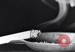 Image of marijuana cigarette New York City USA, 1939, second 15 stock footage video 65675035678