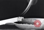 Image of marijuana cigarette New York City USA, 1939, second 16 stock footage video 65675035678