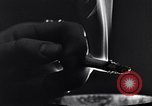 Image of marijuana cigarette New York City USA, 1939, second 52 stock footage video 65675035678