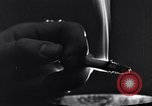 Image of marijuana cigarette New York City USA, 1939, second 53 stock footage video 65675035678