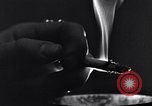 Image of marijuana cigarette New York City USA, 1939, second 54 stock footage video 65675035678