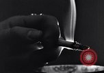 Image of marijuana cigarette New York City USA, 1939, second 55 stock footage video 65675035678