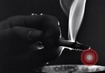Image of marijuana cigarette New York City USA, 1939, second 56 stock footage video 65675035678