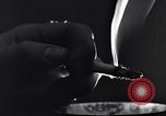 Image of marijuana cigarette New York City USA, 1939, second 58 stock footage video 65675035678