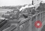 Image of Seam locomotive pulling train up the West side of Manhattan New York City USA, 1915, second 4 stock footage video 65675035688