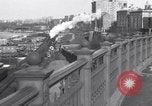 Image of Seam locomotive pulling train up the West side of Manhattan New York City USA, 1915, second 10 stock footage video 65675035688