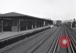 Image of Seam locomotive pulling train up the West side of Manhattan New York City USA, 1915, second 20 stock footage video 65675035688