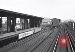 Image of Seam locomotive pulling train up the West side of Manhattan New York City USA, 1915, second 26 stock footage video 65675035688