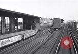 Image of Seam locomotive pulling train up the West side of Manhattan New York City USA, 1915, second 27 stock footage video 65675035688