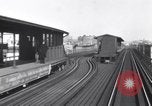 Image of Seam locomotive pulling train up the West side of Manhattan New York City USA, 1915, second 28 stock footage video 65675035688