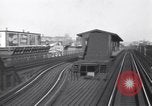 Image of Seam locomotive pulling train up the West side of Manhattan New York City USA, 1915, second 30 stock footage video 65675035688