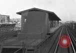 Image of Seam locomotive pulling train up the West side of Manhattan New York City USA, 1915, second 32 stock footage video 65675035688