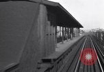 Image of Seam locomotive pulling train up the West side of Manhattan New York City USA, 1915, second 33 stock footage video 65675035688