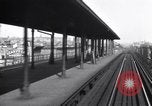 Image of Seam locomotive pulling train up the West side of Manhattan New York City USA, 1915, second 34 stock footage video 65675035688