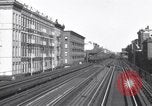 Image of Seam locomotive pulling train up the West side of Manhattan New York City USA, 1915, second 40 stock footage video 65675035688