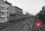Image of Seam locomotive pulling train up the West side of Manhattan New York City USA, 1915, second 44 stock footage video 65675035688