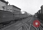 Image of Seam locomotive pulling train up the West side of Manhattan New York City USA, 1915, second 45 stock footage video 65675035688