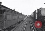 Image of Seam locomotive pulling train up the West side of Manhattan New York City USA, 1915, second 48 stock footage video 65675035688