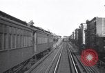Image of Seam locomotive pulling train up the West side of Manhattan New York City USA, 1915, second 49 stock footage video 65675035688