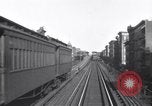 Image of Seam locomotive pulling train up the West side of Manhattan New York City USA, 1915, second 51 stock footage video 65675035688