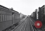 Image of Seam locomotive pulling train up the West side of Manhattan New York City USA, 1915, second 52 stock footage video 65675035688