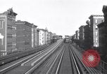 Image of Seam locomotive pulling train up the West side of Manhattan New York City USA, 1915, second 57 stock footage video 65675035688