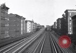 Image of Seam locomotive pulling train up the West side of Manhattan New York City USA, 1915, second 58 stock footage video 65675035688