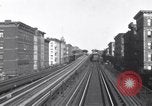 Image of Seam locomotive pulling train up the West side of Manhattan New York City USA, 1915, second 60 stock footage video 65675035688