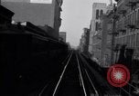 Image of POV front and rear of moving train New York City USA, 1916, second 42 stock footage video 65675035690