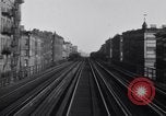 Image of POV front and rear of moving train New York City USA, 1916, second 61 stock footage video 65675035690