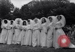 Image of Nine couples marry in Brooklyn's Prospect Park New York City USA, 1967, second 4 stock footage video 65675035699