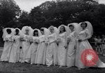 Image of Nine couples marry in Brooklyn's Prospect Park New York City USA, 1967, second 6 stock footage video 65675035699