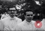 Image of Nine couples marry in Brooklyn's Prospect Park New York City USA, 1967, second 15 stock footage video 65675035699