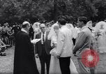 Image of Nine couples marry in Brooklyn's Prospect Park New York City USA, 1967, second 20 stock footage video 65675035699