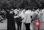 Image of Nine couples marry in Brooklyn's Prospect Park New York City USA, 1967, second 21 stock footage video 65675035699