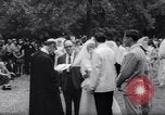 Image of Nine couples marry in Brooklyn's Prospect Park New York City USA, 1967, second 22 stock footage video 65675035699
