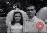 Image of Nine couples marry in Brooklyn's Prospect Park New York City USA, 1967, second 26 stock footage video 65675035699