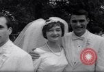 Image of Nine couples marry in Brooklyn's Prospect Park New York City USA, 1967, second 28 stock footage video 65675035699