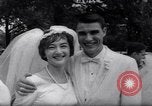 Image of Nine couples marry in Brooklyn's Prospect Park New York City USA, 1967, second 29 stock footage video 65675035699