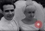 Image of Nine couples marry in Brooklyn's Prospect Park New York City USA, 1967, second 30 stock footage video 65675035699