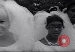 Image of Nine couples marry in Brooklyn's Prospect Park New York City USA, 1967, second 31 stock footage video 65675035699