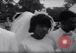 Image of Nine couples marry in Brooklyn's Prospect Park New York City USA, 1967, second 34 stock footage video 65675035699