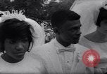 Image of Nine couples marry in Brooklyn's Prospect Park New York City USA, 1967, second 36 stock footage video 65675035699