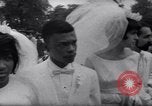 Image of Nine couples marry in Brooklyn's Prospect Park New York City USA, 1967, second 38 stock footage video 65675035699